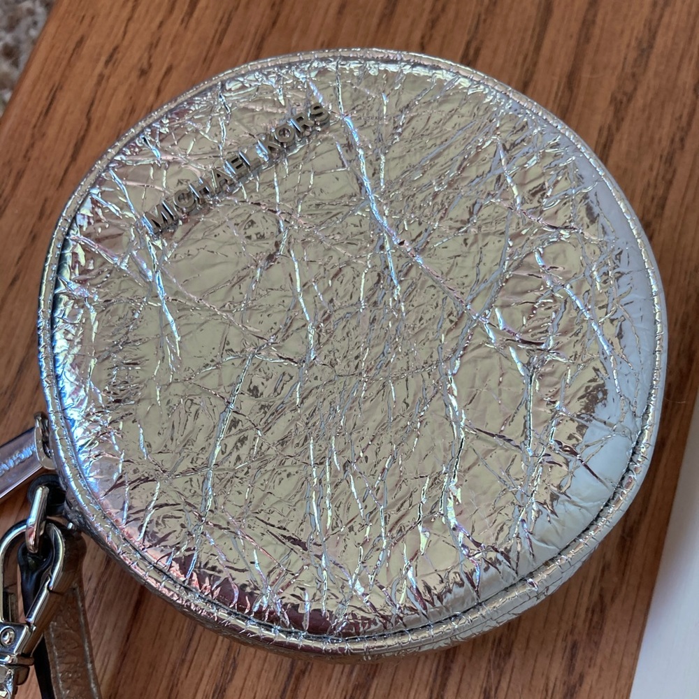 Small never used Michael Kors change purse!